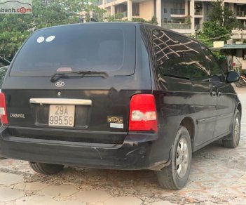 Kia Carnival LS 2.5 AT 2009 - Bán Kia Carnival LS 2.5 AT đời 2009, màu đen, số tự động