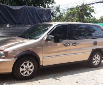 Kia Carnival   2009 - Bán xe cũ Kia Carnival 2009, màu nâu, 250tr