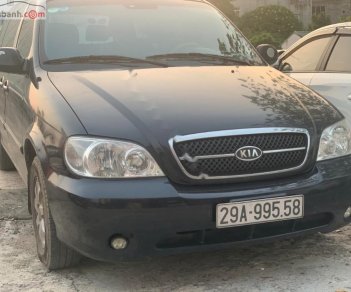 Kia Carnival LS 2.5 AT 2009 - Bán Kia Carnival LS 2.5 AT đời 2009, màu đen, số tự động