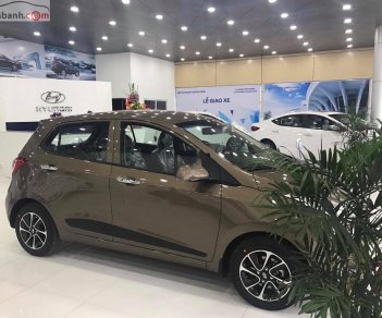 Hyundai Grand i10   1.2 AT 2019 - Cần bán Hyundai Grand i10 1.2 AT sản xuất 2019, màu nâu