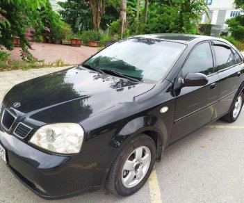 Daewoo Lacetti EX 2005 - Nhà bán Daewoo Lacetti EX đời 2005, màu đen số sàn