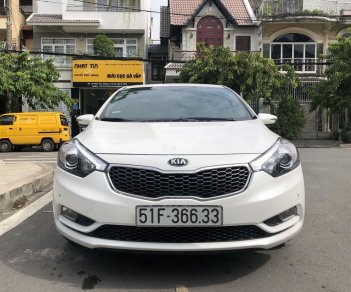 Kia K3   2.0 2015 - Cần bán xe Kia K3 2.0 sản xuất năm 2015, màu trắng xe gia đình