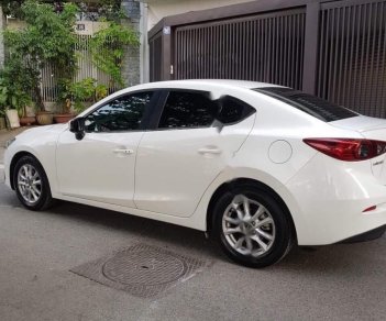 Mazda 3 1.5 AT 2016 - Cần bán gấp Mazda 3 1.5 AT sản xuất năm 2016, màu trắng