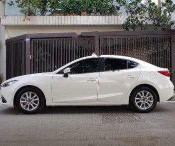 Mazda 3 1.5 AT 2016 - Cần bán gấp Mazda 3 1.5 AT sản xuất năm 2016, màu trắng