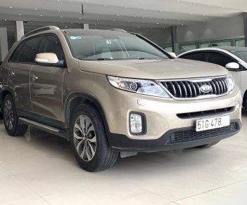 Kia Sorento   2017 - Cần bán Kia Sorento GATH 2.4AT model 2017 full option, màu vàng, xe đẹp, biển SG