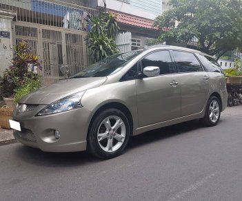 Mitsubishi Grandis AT 2009 - Cần bán Grandish sx 2009 số tự động, màu vàng cát