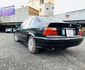 BMW 3 Series 320i 1995 - Bán BMW 320i sản xuất 1995, màu đen, nhập khẩu