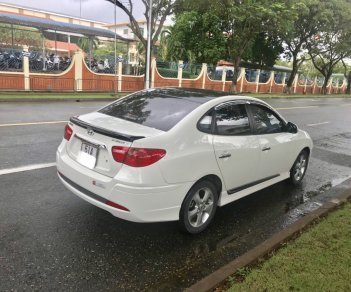 Hyundai Avante 2012 - Chính chủ bán Avante 1.6AT 2012, màu trắng, đúng 11000km sơ cua chưa hạ, biển TP, giá TL