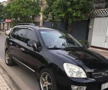 Kia Carens   2009 - Cần bán Kia Carens đời 2009, màu đen, nhập khẩu