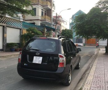 Kia Carens   2009 - Cần bán Kia Carens đời 2009, màu đen, nhập khẩu