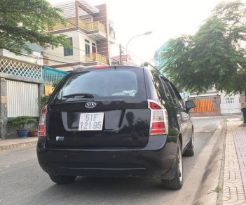 Kia Carens   2009 - Cần bán Kia Carens đời 2009, màu đen, nhập khẩu