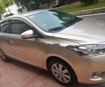 Toyota Vios 2015 - Cần bán lại xe Toyota Vios 2015, màu vàng chính chủ