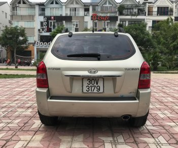 Hyundai Tucson 2.0AT 2009 - Bán Hyundai Tucson 2.0AT 2009, màu vàng, nhập khẩu, 390 triệu