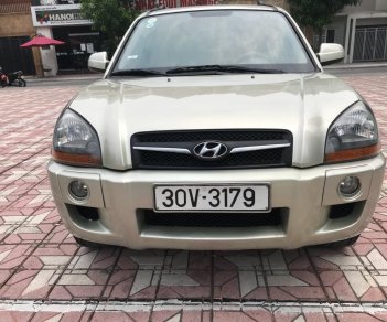 Hyundai Tucson 2.0AT 2009 - Bán Hyundai Tucson 2.0AT 2009, màu vàng, nhập khẩu, 390 triệu