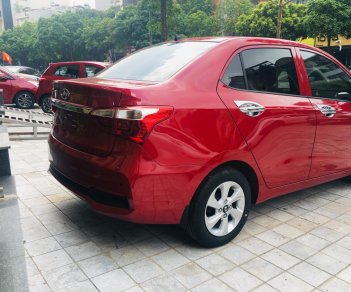 Hyundai Grand i10 1.2 AT   2019 - Bán Hyundai 1.2 AT sedan 2019, màu đỏ sẵn xe giao ngay, hỗ trợ trả góp lên đến 80%, chỉ 100tr nhận xe