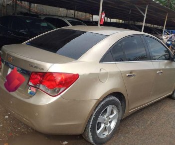 Chevrolet Cruze   2013 - Bán Chevrolet Cruze đời 2013, màu vàng số sàn