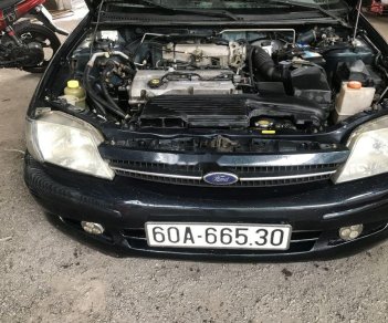 Ford Laser   2000 - Bán Ford Laser năm sản xuất 2000, màu đen, xe nhập