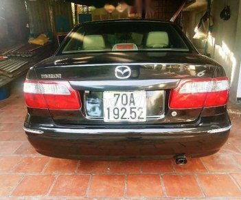 Mazda 626 1999 - Cần bán Mazda 626 đời 1999, màu đen, xe nhập chính chủ, giá 165tr