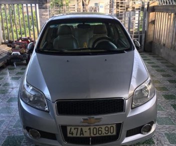 Chevrolet Aveo 2014 - Cần bán lại xe Chevrolet Aveo năm sản xuất 2014, màu bạc xe gia đình