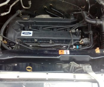 Ford Escape 2005 - Bán Ford Escape 2.3 đời 2005, màu đen, số tự động