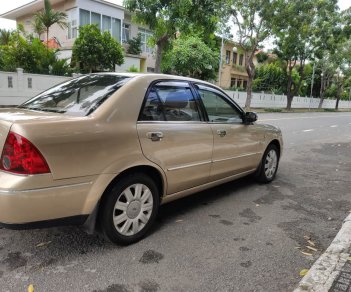 Ford Laser 2004 - Ford Laser 1.8 số tự động, vàng cát 2004