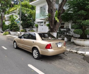 Ford Laser 2004 - Ford Laser 1.8 số tự động, vàng cát 2004