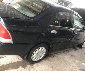 Ford Laser   2000 - Bán Ford Laser năm sản xuất 2000, màu đen, xe nhập