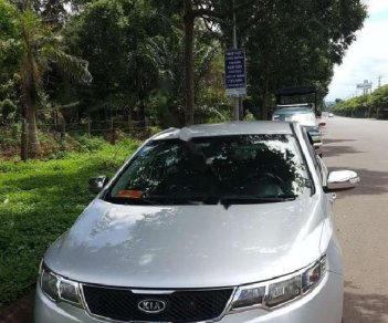 Kia Forte EX 1.6 MT 2010 - Gia đình bán Kia Forte EX 1.6 MT đời 2010, màu bạc số sàn