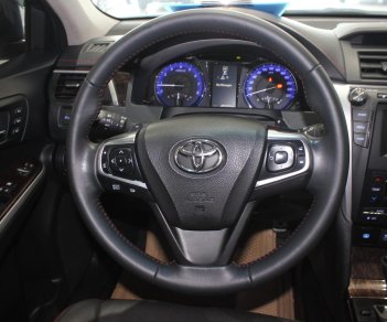 Toyota Camry 2.5Q 2016 - Cần bán xe Toyota Camry 2.5Q sản xuất năm 2016, màu vàng, biển SG, giá tốt