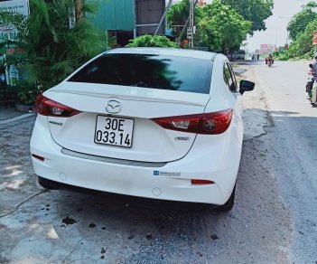 Mazda 3 1.5AT 2016 - Do nhu cầu đổi lên xe 7 chỗ cần bán xe Mazda 3 2016, màu trắng, 580 triệu