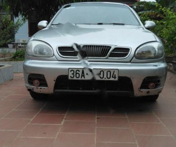 Daewoo Lanos SX 2004 - Bán ô tô Daewoo Lanos SX sản xuất năm 2004, màu bạc