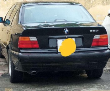 BMW 3 Series   1997 - Bán BMW 320 1997, màu đen, xe nhập  