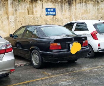 BMW 3 Series   1997 - Bán BMW 320 1997, màu đen, xe nhập  