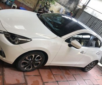 Mazda 2   2016 - Bán Mazda 2 năm sản xuất 2016, xe mới chạy 17.600 km, 498tr