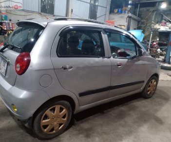 Chevrolet Spark 2011 - Cần bán gấp Chevrolet Spark sản xuất 2011, màu bạc