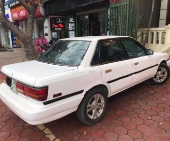 Toyota Camry 1990 - Gia đình bán Toyota Camry năm 1990, màu trắng, nhập khẩu