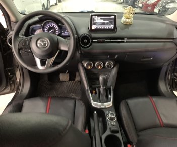 Mazda 2 2016 - Bán xe Mazda 2 1.5AT đời 2016, màu kem (be), 475tr