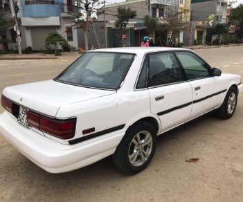 Toyota Camry 1990 - Gia đình bán Toyota Camry năm 1990, màu trắng, nhập khẩu