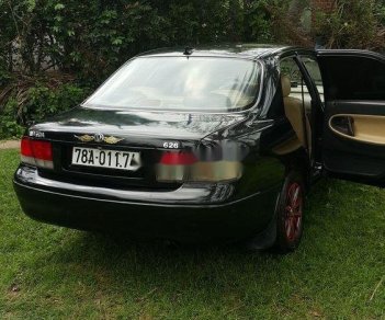 Mazda 626 1996 - Cần bán lại xe Mazda 626 sản xuất 1996, màu đen, xe nhập