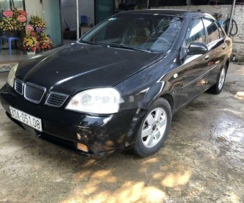 Daewoo Lacetti   2005 - Cần bán Daewoo Lacetti năm sản xuất 2005, màu đen, giá chỉ 125 triệu