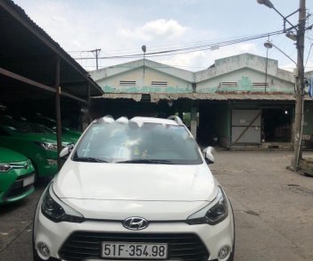 Hyundai i20 Active 2015 - Cần bán Hyundai i20 Active sản xuất năm 2015, màu trắng, nhập khẩu 