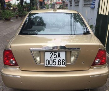 Ford Laser 2002 - Bán xe Ford Laser đời 2002, màu vàng cát