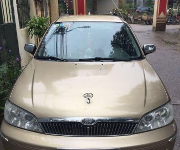 Ford Laser 2002 - Bán xe Ford Laser đời 2002, màu vàng cát