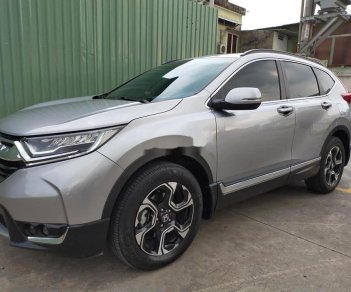 Honda CR V 1.5 L  2019 - Gia đình cần bán xe Honda CR V 1.5 L SX 2019, màu bạc, xe nhập