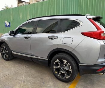 Honda CR V 1.5 L  2019 - Gia đình cần bán xe Honda CR V 1.5 L SX 2019, màu bạc, xe nhập