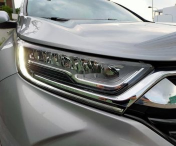 Honda CR V 1.5 L  2019 - Gia đình cần bán xe Honda CR V 1.5 L SX 2019, màu bạc, xe nhập