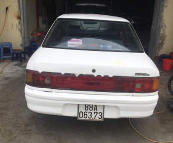 Mazda 323 1.6 MT 1993 - Xe Mazda 323 1.6 MT năm 1993, màu trắng, xe nhập