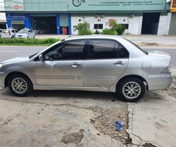 Mitsubishi Lancer GLX 1.6 AT 2004 - Cần bán Mitsubishi Lancer GLX 1.6 AT đời 2004, màu bạc  