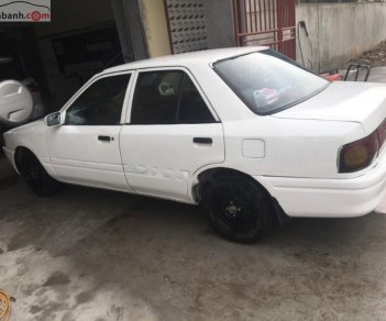 Mazda 323 1.6 MT 1993 - Xe Mazda 323 1.6 MT năm 1993, màu trắng, xe nhập