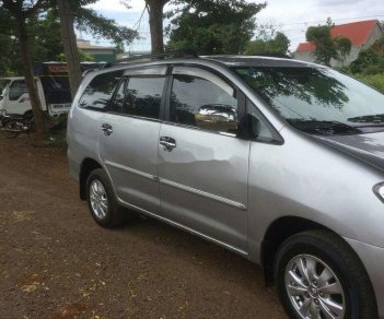 Toyota Innova G 2009 - Gia đình bán Toyota Innova G đời 2009, màu bạc